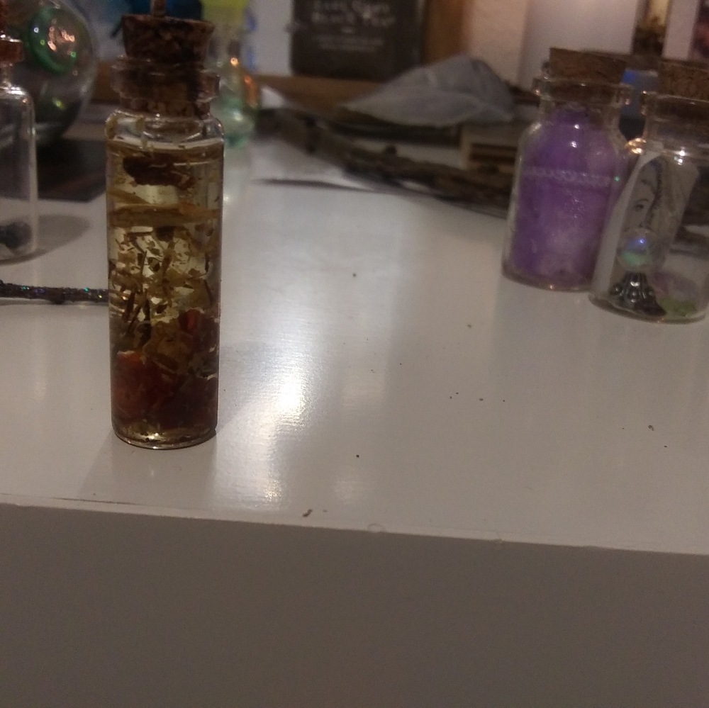 Decorative pendant with conjure oil ( necklace)